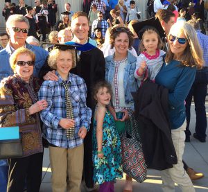 Josh Gramling, MS celebrates his newly earned PhD with his family, May 2017